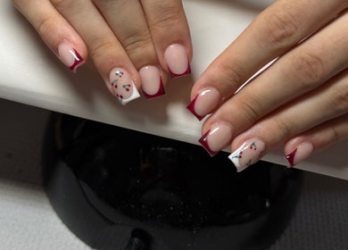 Cherry nail art at The Beauty Lounge, Swindon, England, GB. Perfect manicure with red accents.
