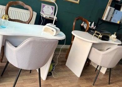 Elegant nail station at Hair HQ Ilkeston, Ilkeston, England, GB offers chic beauty and wellness experience.