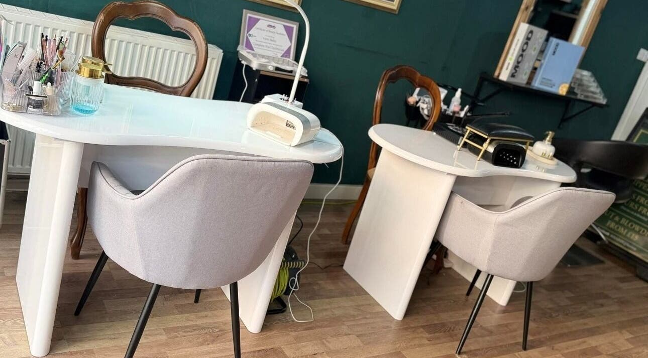 Elegant nail station at Hair HQ Ilkeston, Ilkeston, England, GB offers chic beauty and wellness experience.