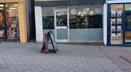 Entrance of Hair HQ Ilkeston, a stylish salon in Ilkeston, England, GB, showcasing a modern and welcoming façade.