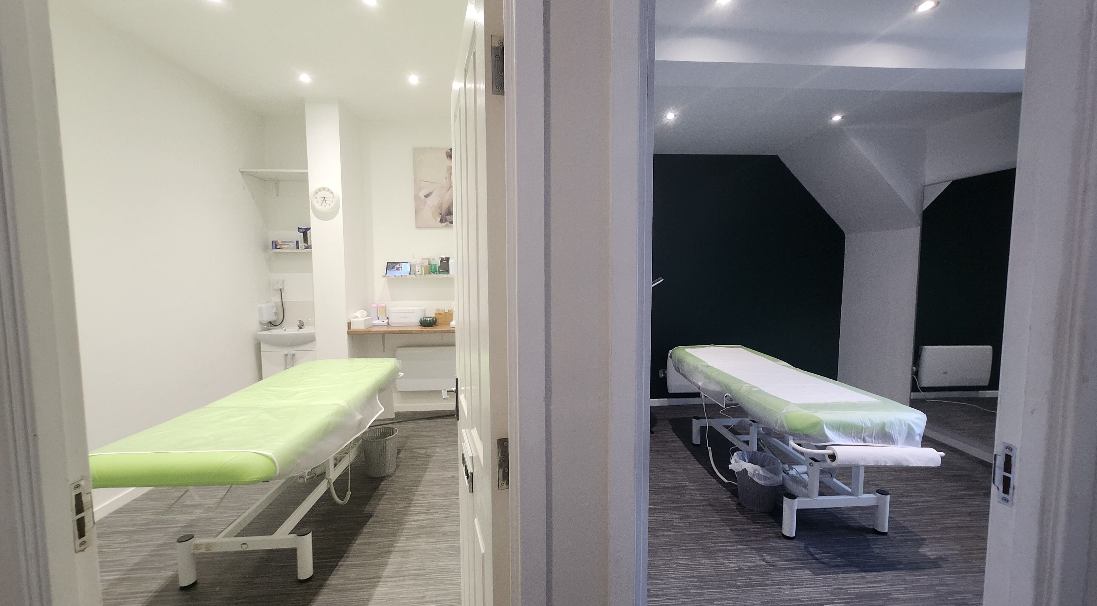 Tranquil treatment rooms at Next Level Spa & Beauty in Wallsend, England, GB, featuring massage beds.