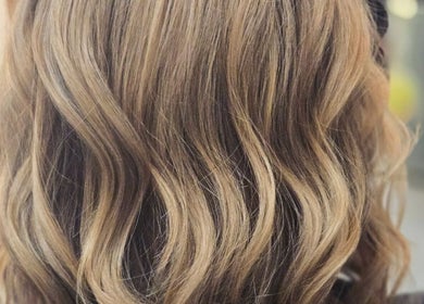 Stylish wavy hair design at Kalos Hair Design, Asheville, North Carolina, US.