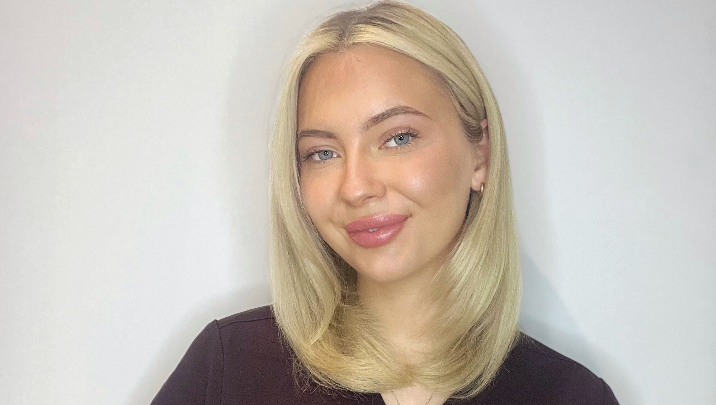 Smiling individual at The Skin Studio, Skegness, England, GB, showcasing beauty and wellness results.