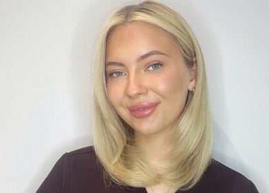 Smiling individual at The Skin Studio, Skegness, England, GB, showcasing beauty and wellness results.