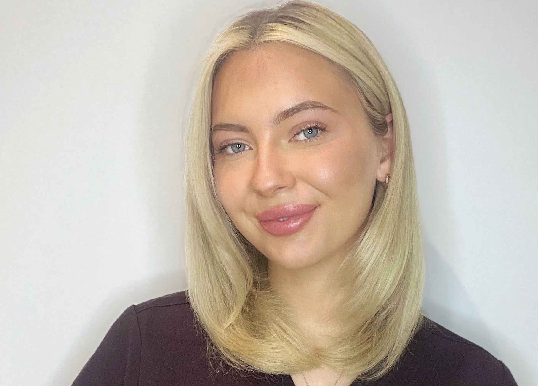 Smiling individual at The Skin Studio, Skegness, England, GB, showcasing beauty and wellness results.