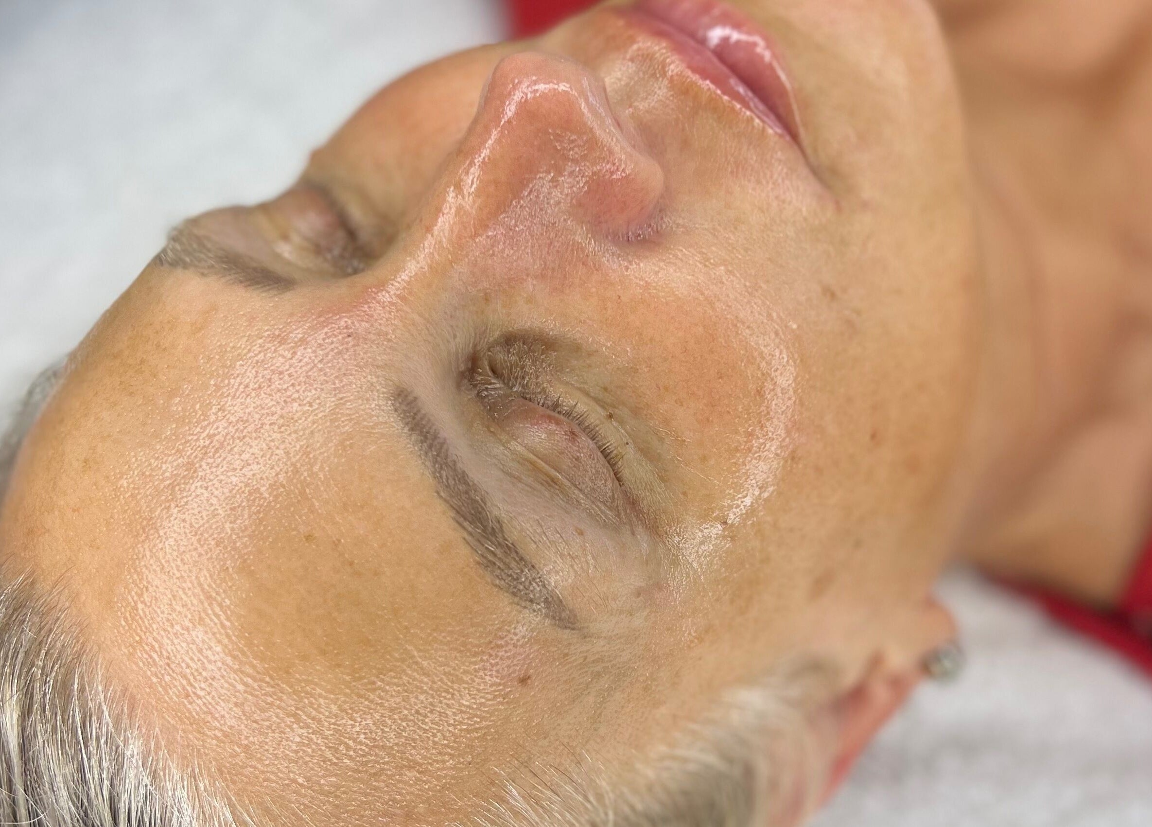 Glowing skin treatment at The Skin Studio, Skegness, England, GB. Client enjoying relaxing facial.