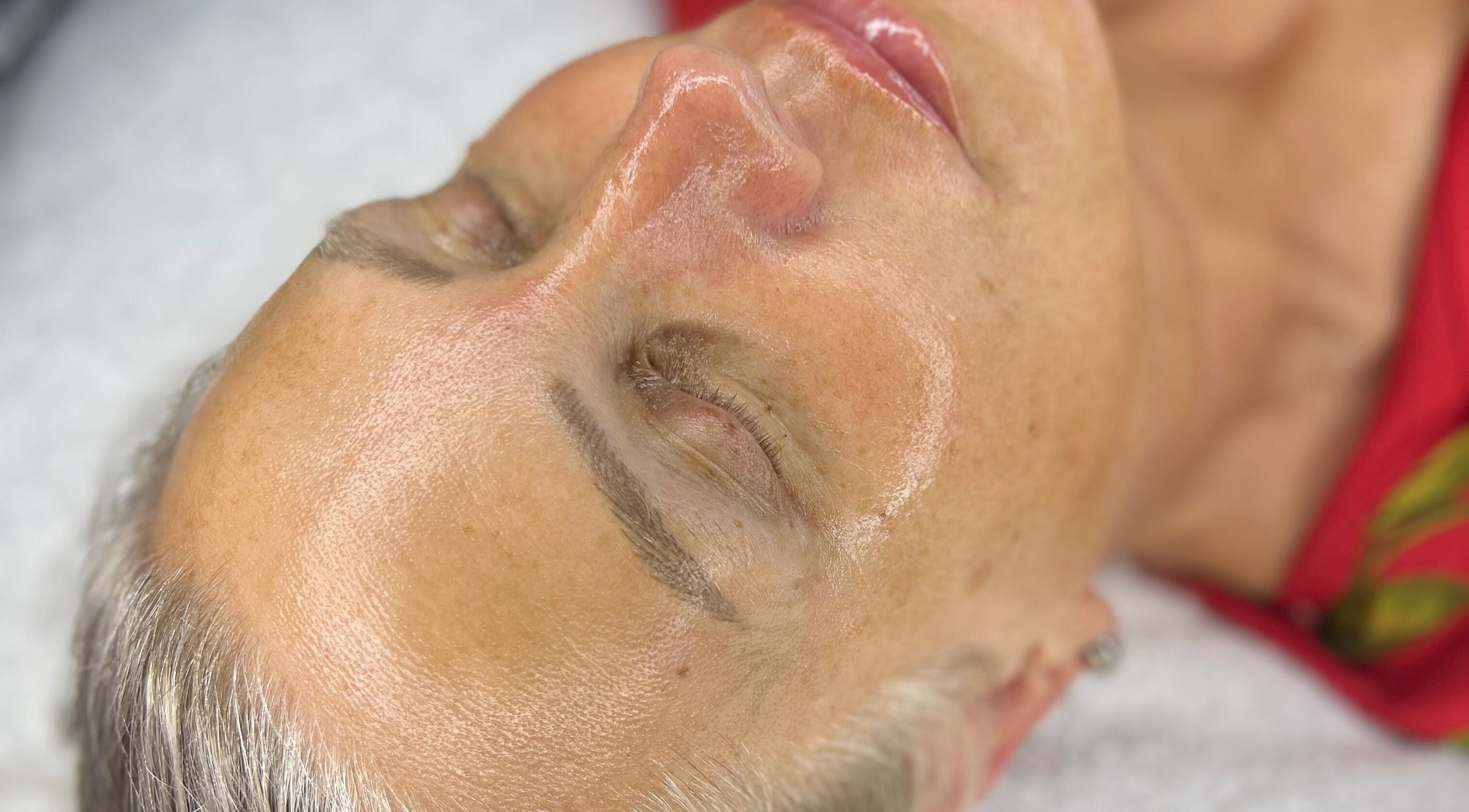 Glowing skin treatment at The Skin Studio, Skegness, England, GB. Client enjoying relaxing facial.