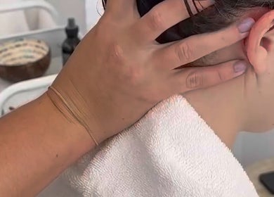 A soothing neck massage at RESET BEAUTY BAR BRISBANE in Milton, Queensland, AU, providing ultimate relaxation.