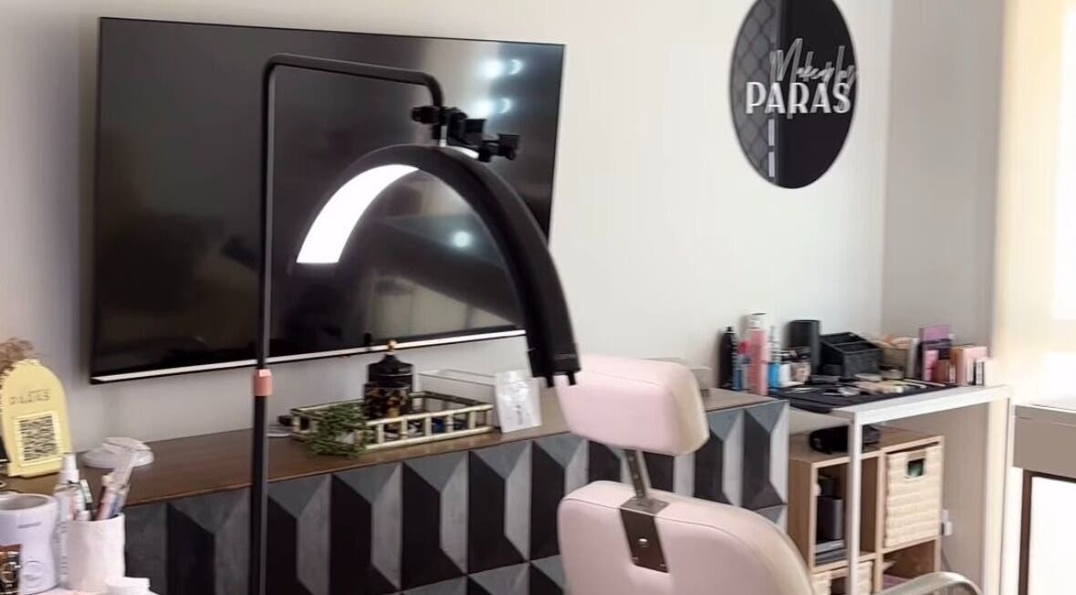 Beauty setup at By Paras, Carindale, Queensland, AU. Modern chair, products, and signature decor visible.