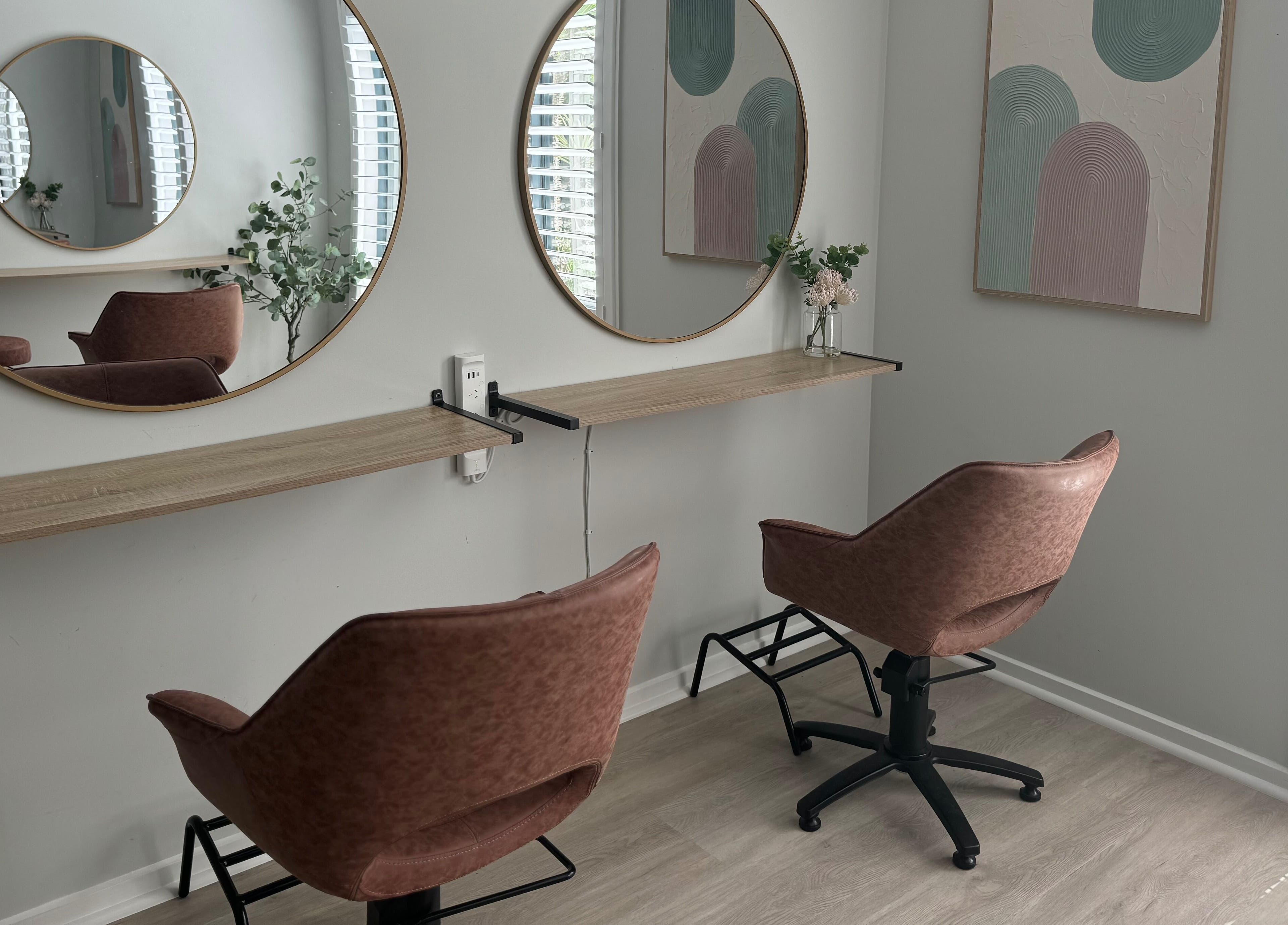 Chic salon setup at Studio 12 - Hair By Fiona, Thornlands, Queensland, AU with stylish chairs and mirrors.