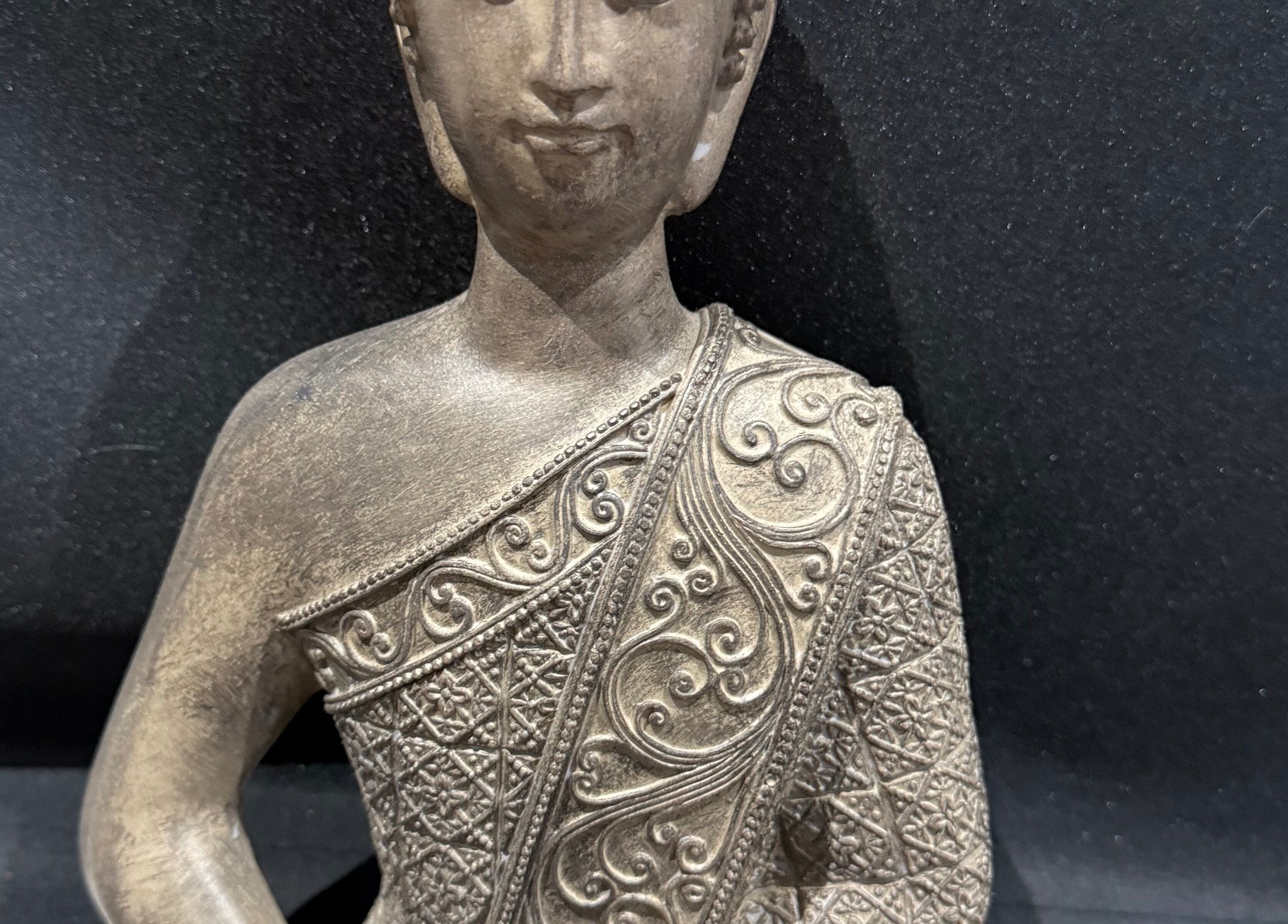 Intricately carved sculpture at The Mane Room, Cookham, England, GB, adding elegance and cultural charm.