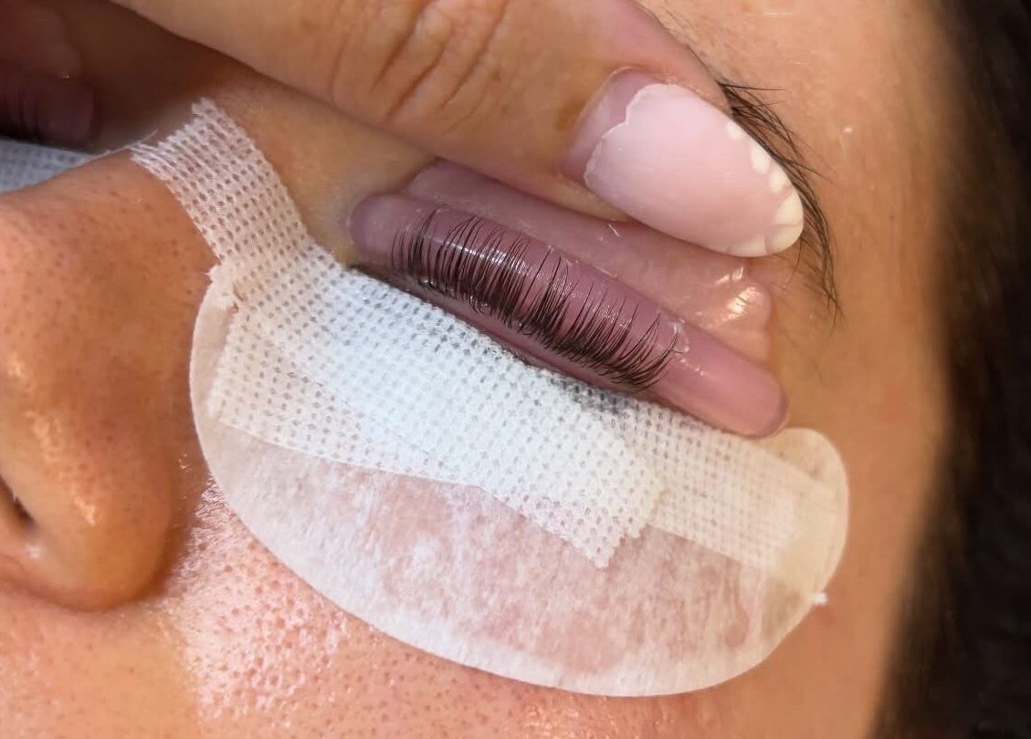 Eyelash extension application at Lashes By Yas X, Ashbourne, England, GB. Close-up of lash treatment.