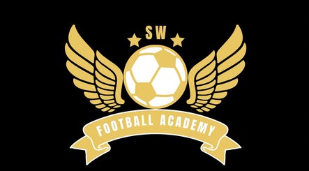 Logo of SW Football Academy featuring golden wings and a soccer ball in Worcester Park, England, GB.