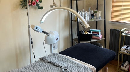 Elegant treatment room at Zafirah Aesthetic Studio, London, England, GB with modern equipment and cozy ambiance.