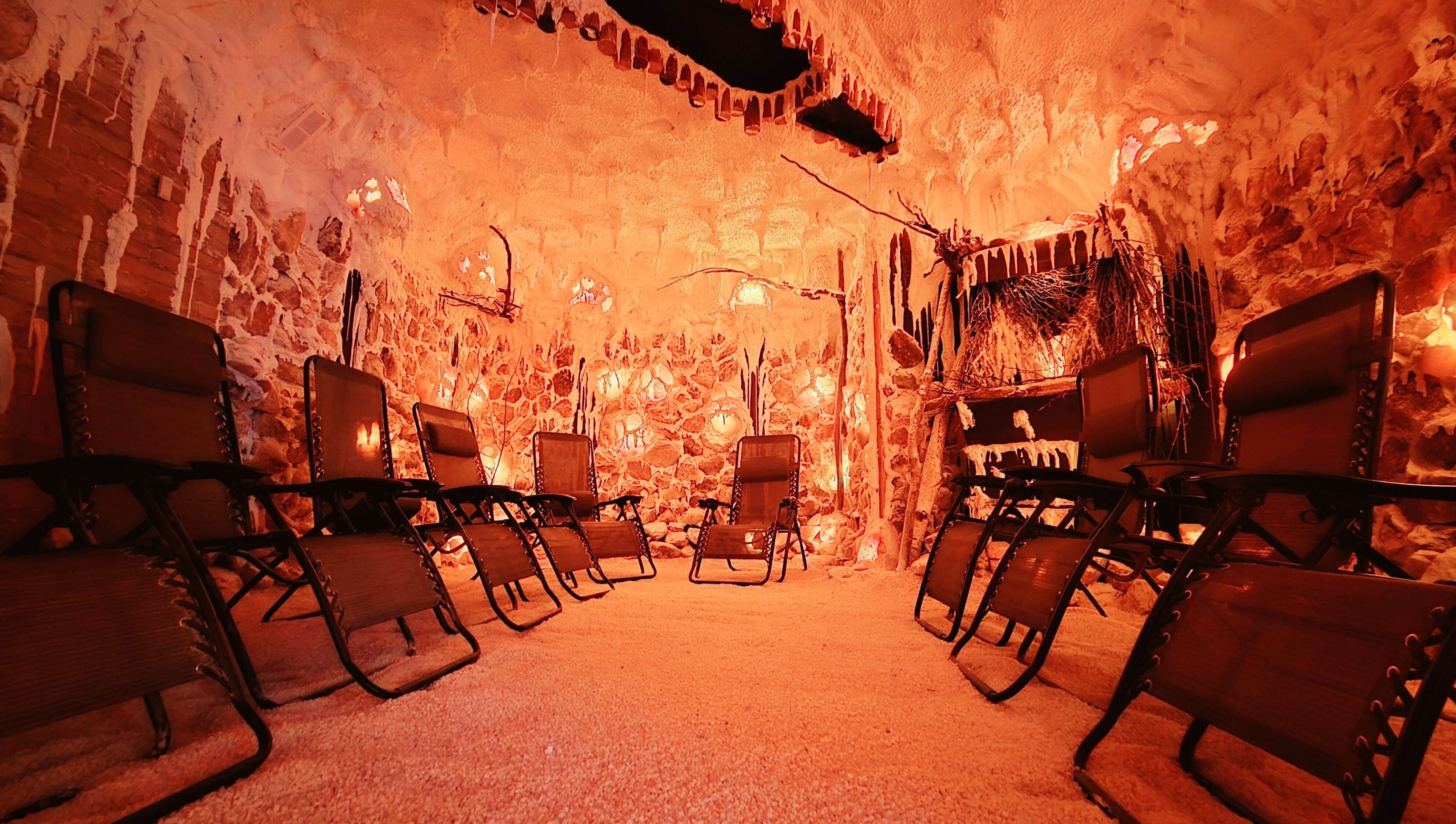 Relaxing salt cave at Simply Salt Wellness & Salt Cave, Welland, Ontario, CA with tranquil seating arrangement.