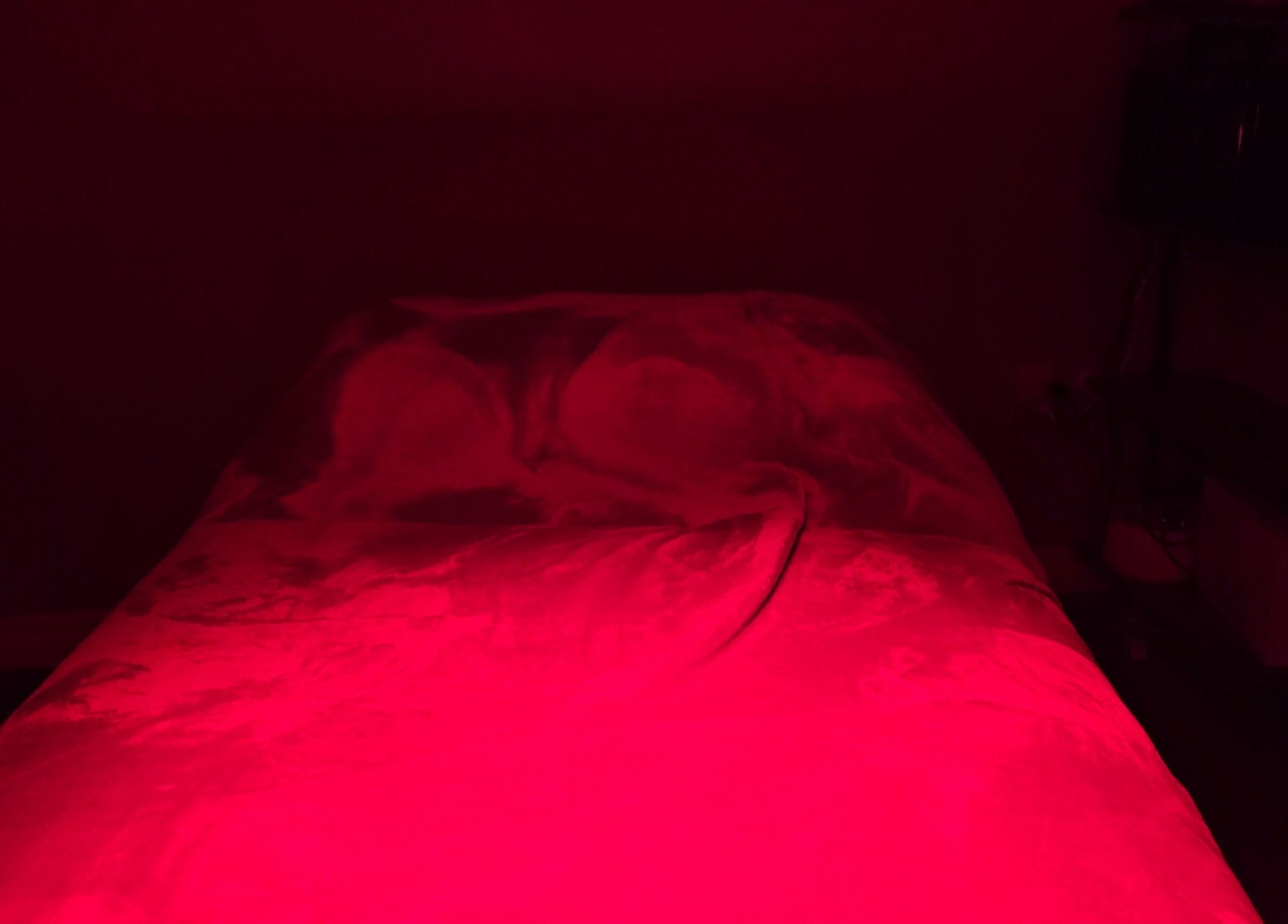Relaxing red therapy room at Simply Salt Wellness & Salt Cave in Welland, Ontario, CA, featuring a serene atmosphere.