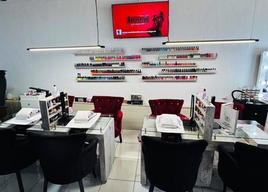 Elegant nail salon setup at Ajijic Nails Salón in Ajijic, Jalisco, MX, featuring manicured stations and vibrant polishes.