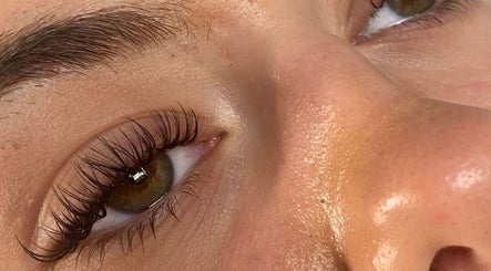 Close-up of perfectly curled lashes at Adoré Studio, Hatfield, England, GB, showcasing refined beauty.