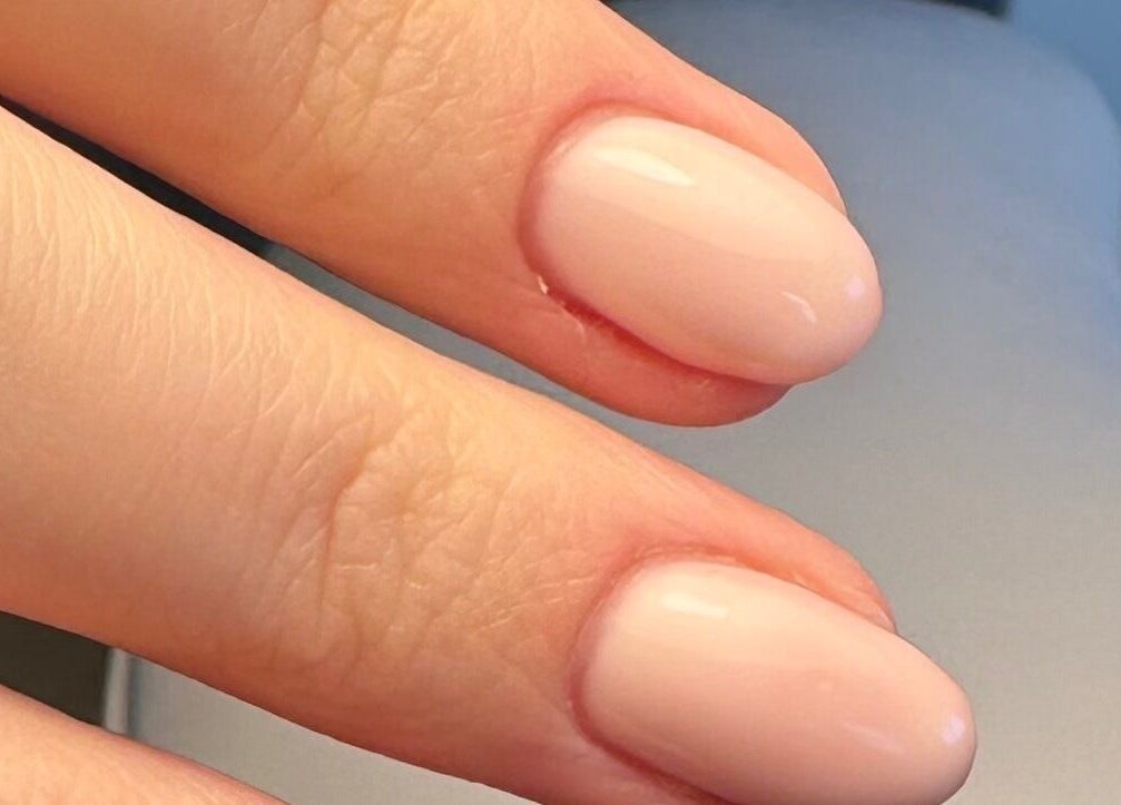 Close-up of a nude manicure at LGD nails, Fareham, England, GB, showcasing elegant gel polish.