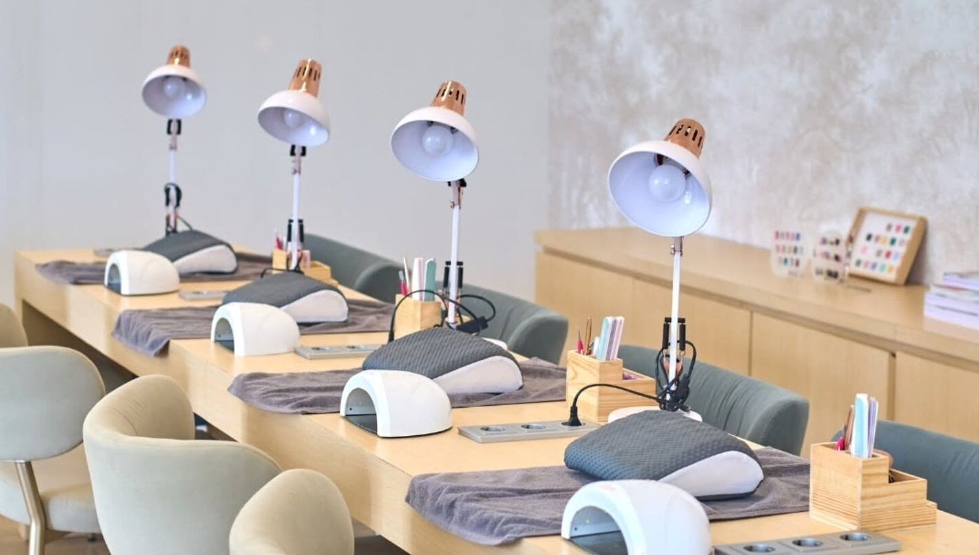 Modern nail station at Korra Spa and Nails, Bali, Bali, ID, featuring manicure tools and comfortable seating.