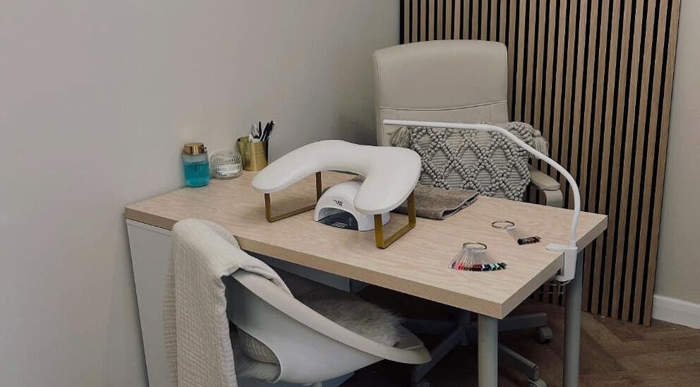 Modern nail station at Structure Beauty, Pickering, England, GB, featuring elegant decor and professional tools.