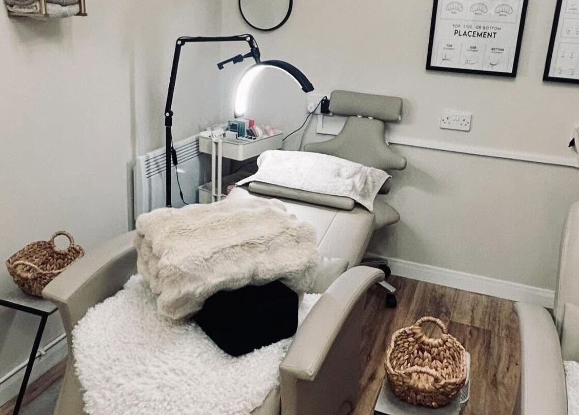 Cozy treatment room at Structure Beauty in Pickering, England, GB with plush chairs and calming decor.