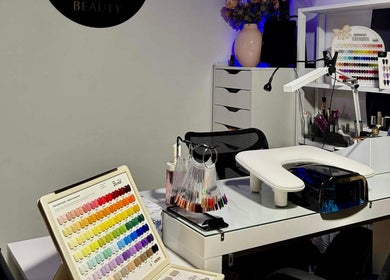 See More Beauty nail design station in Marcoola, Queensland, AU, featuring polish samples and manicure tools.