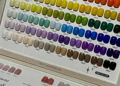 Colorful nail palette display at See More Beauty, Marcoola, Queensland, AU, shows a variety of nail polish options.