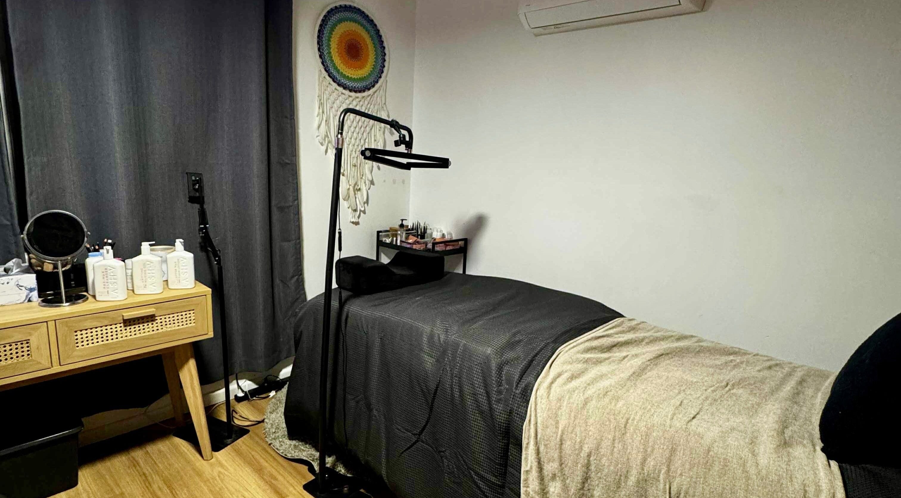 Relaxing spa room at See More Beauty, Marcoola, Queensland, AU, with cozy treatment bed and calming decor.