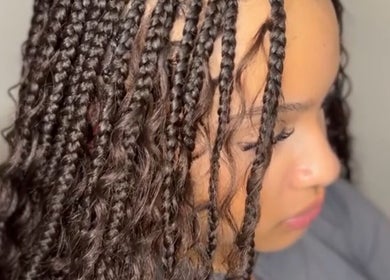 Intricate braids hairstyle at TC Styledit, Nottingham, England, GB, showcasing expert styling and attention to detail.