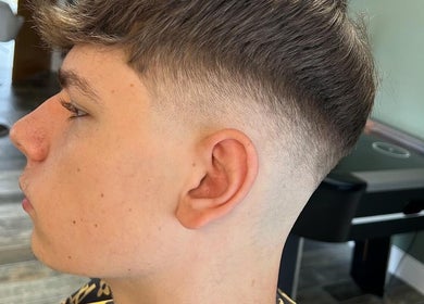 Close-up of a stylish taper fade haircut at LS cuts in Scunthorpe, England, GB.