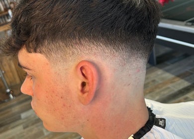 Trendy men's haircut at LS Cuts, Scunthorpe, England, GB.