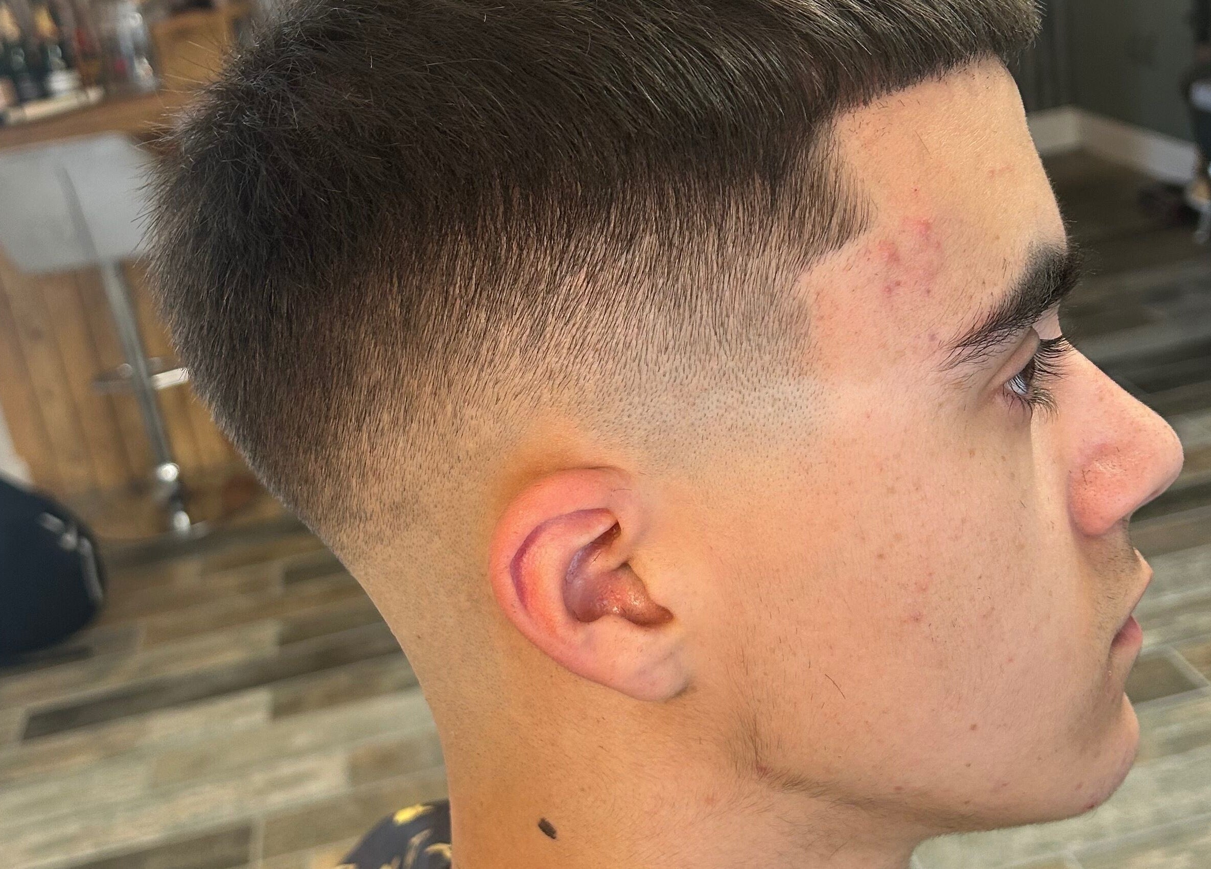 Close-up of a fresh fade haircut at LS Cuts, Scunthorpe, England, GB. Modern salon style.