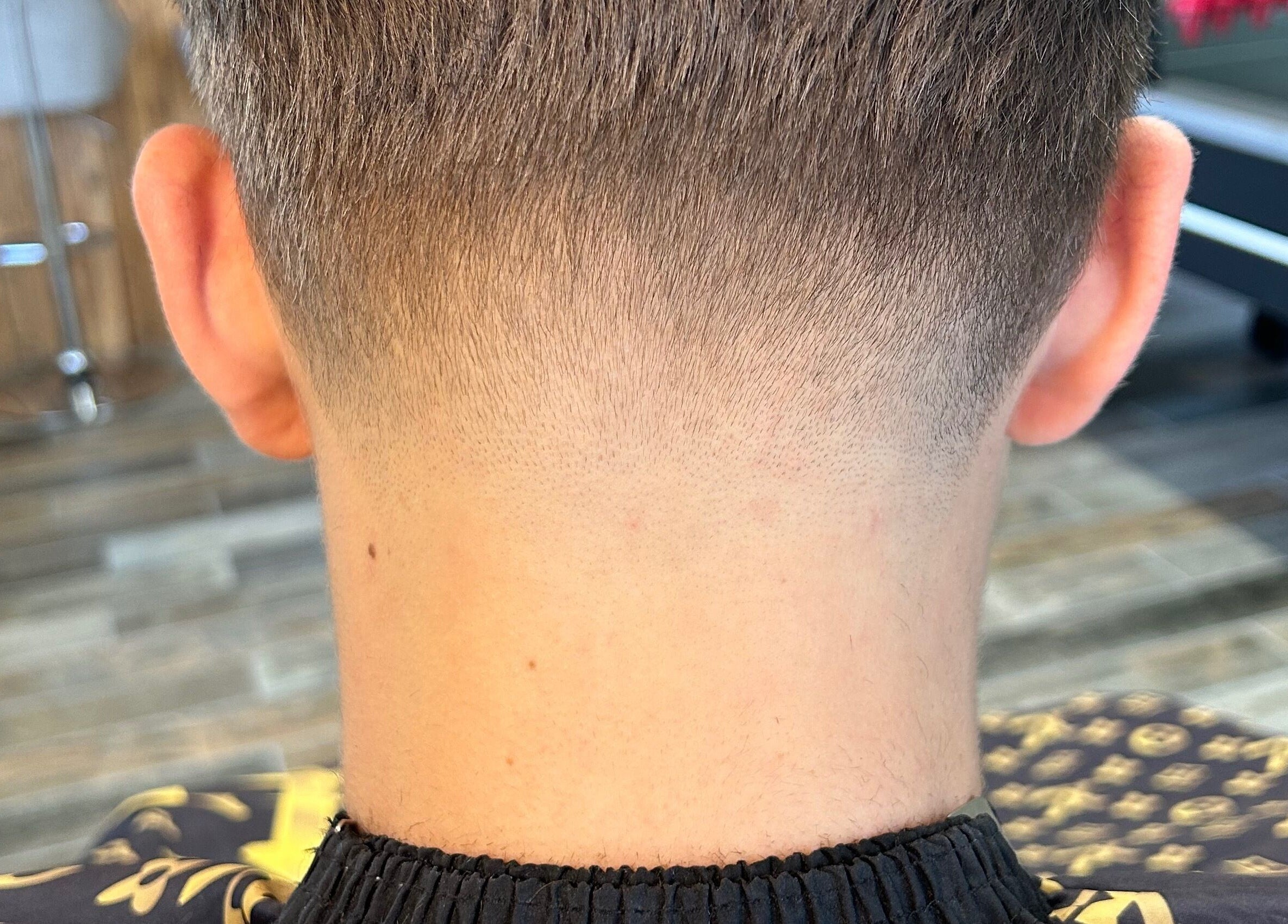 Close-up of a precision haircut at LS Cuts in Scunthorpe, England, GB showing a smooth fade.