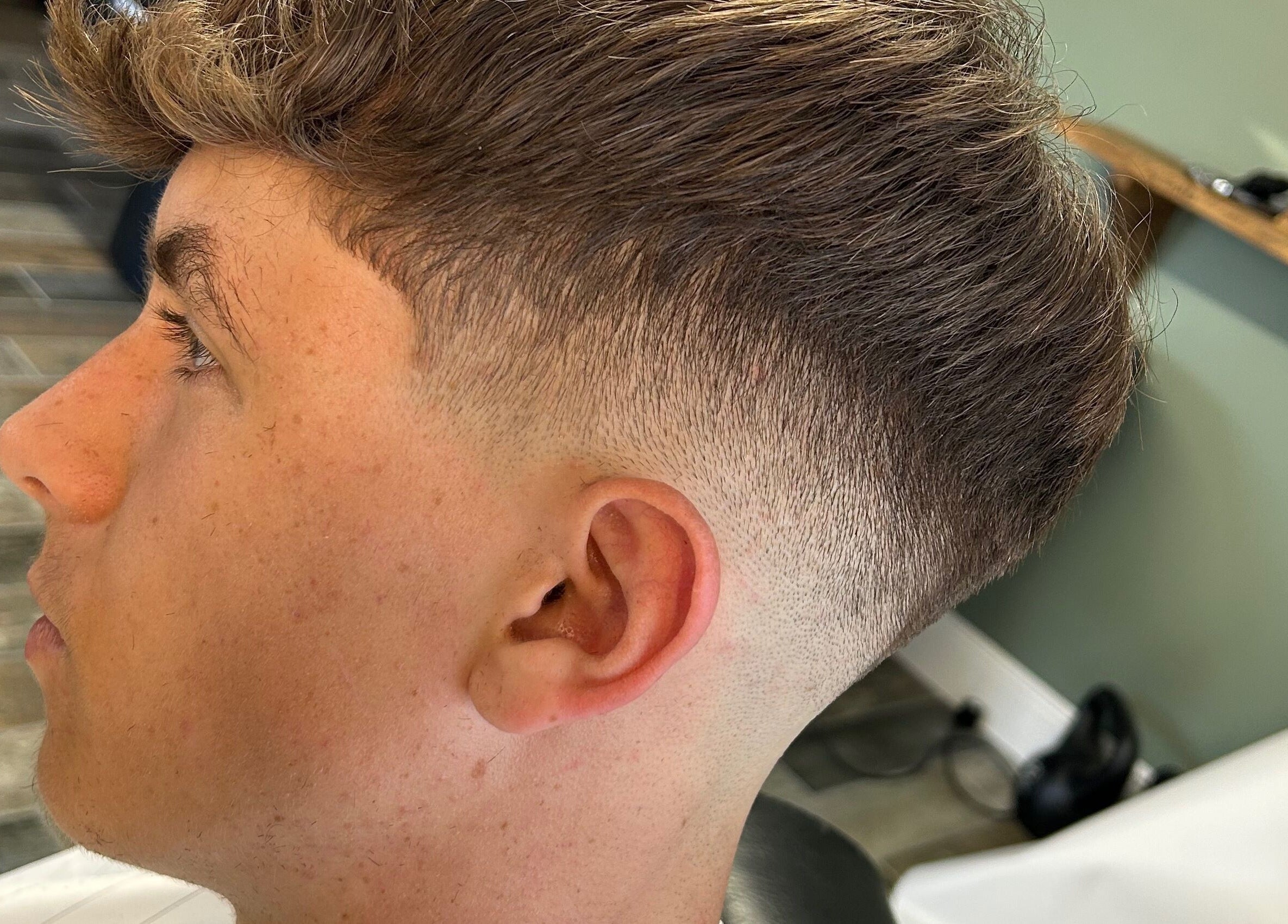 Close-up of a sharp fade haircut at LS Cuts, Scunthorpe, England, GB. Showcasing precise barber skills.