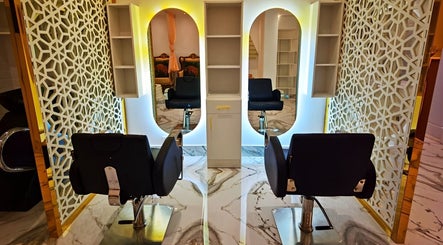 Luxurious salon chairs and ornate mirrors at Thai House Beauty and Spa, Abu Dhabi, AE.