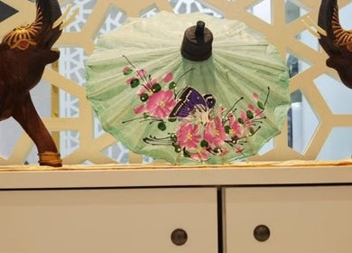 Decorative Thai artifacts at Home Service - Thai House Beauty and Spa in AE enhance the cultural ambiance.