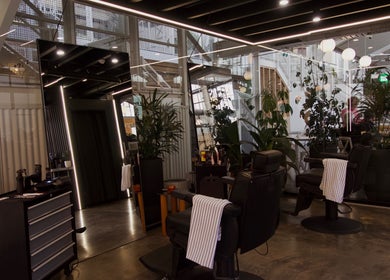 Modern salon at Frank - Lately with sleek design and greenery in Bowden, South Australia, AU.