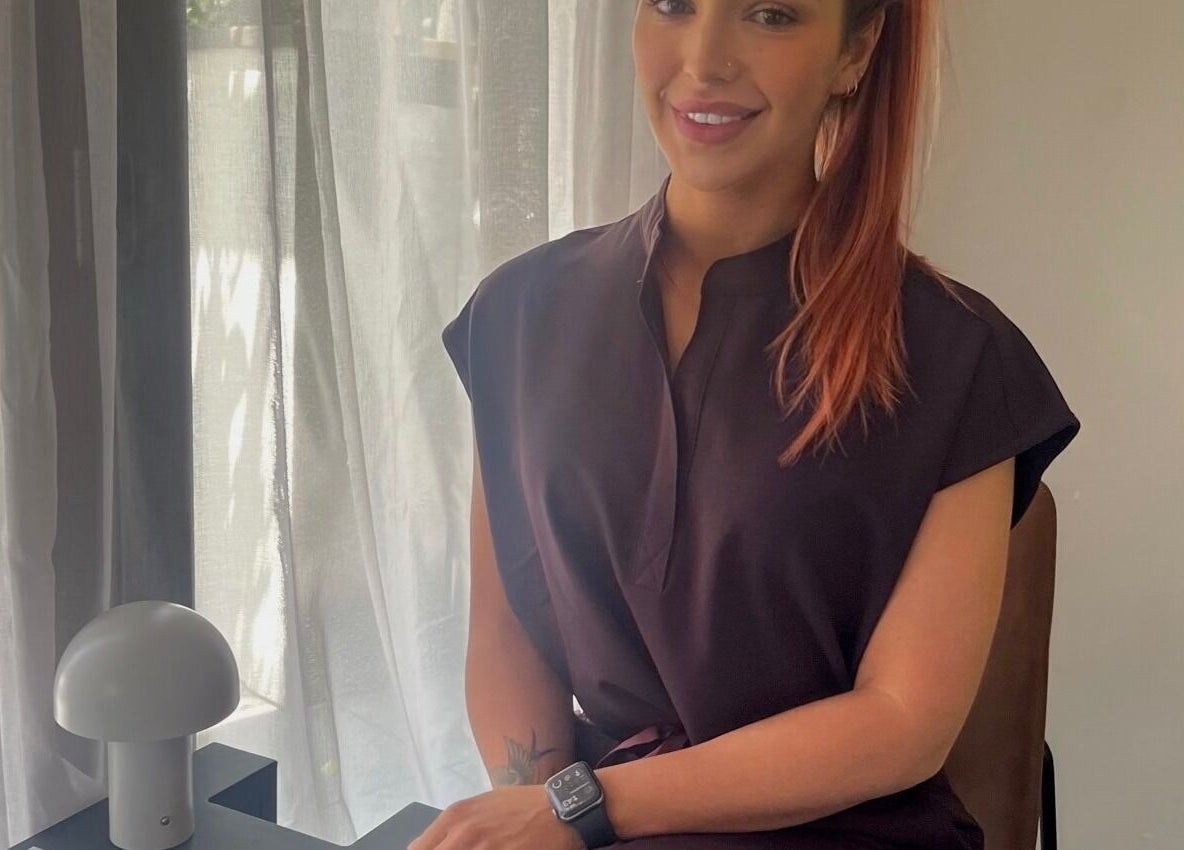 Friendly consultant at Glow With Me Alexia, Melbourne, Victoria, AU, in a warm, inviting atmosphere.