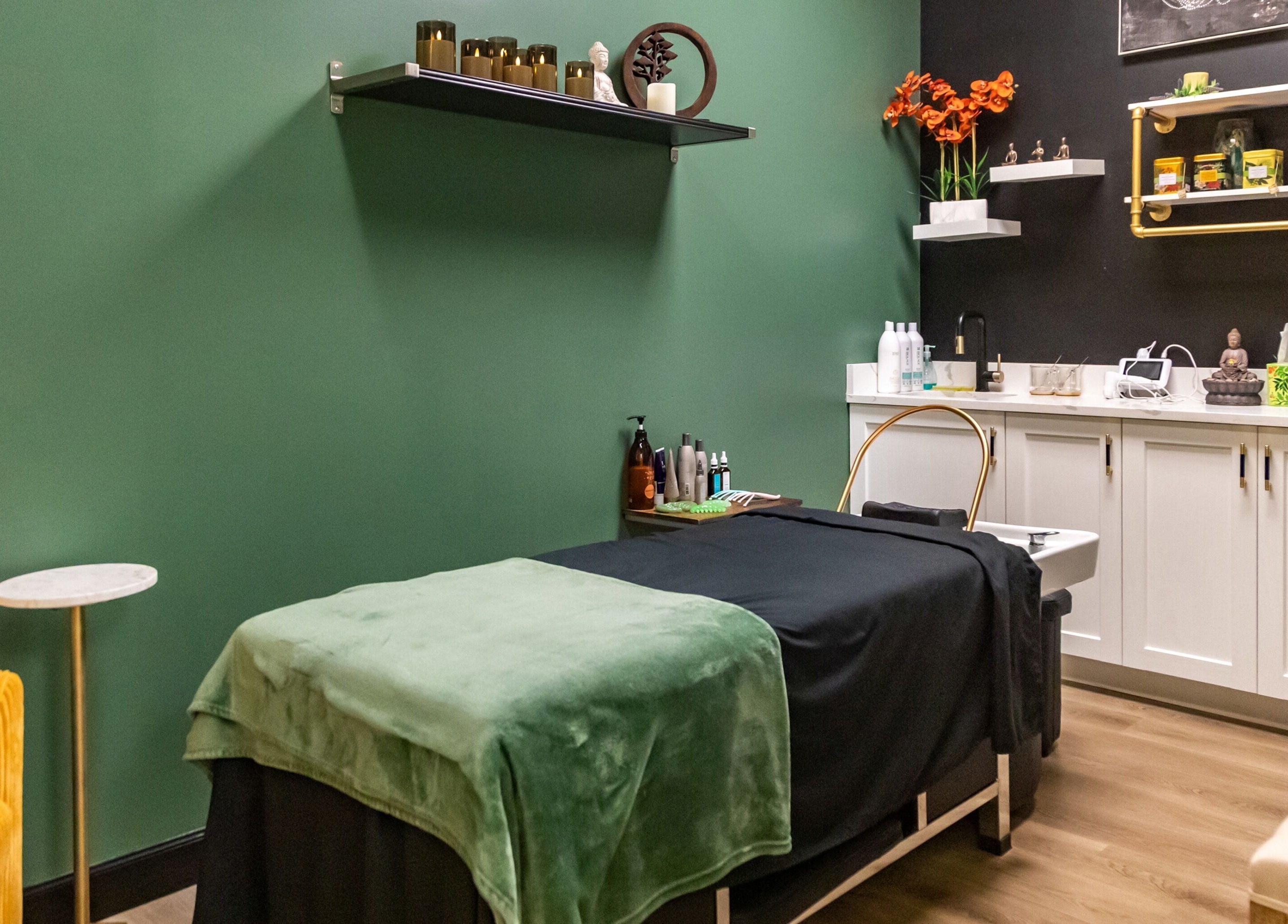 Relaxing spa room at Just in Style with green accents. Located in St. Louis, Missouri, US.