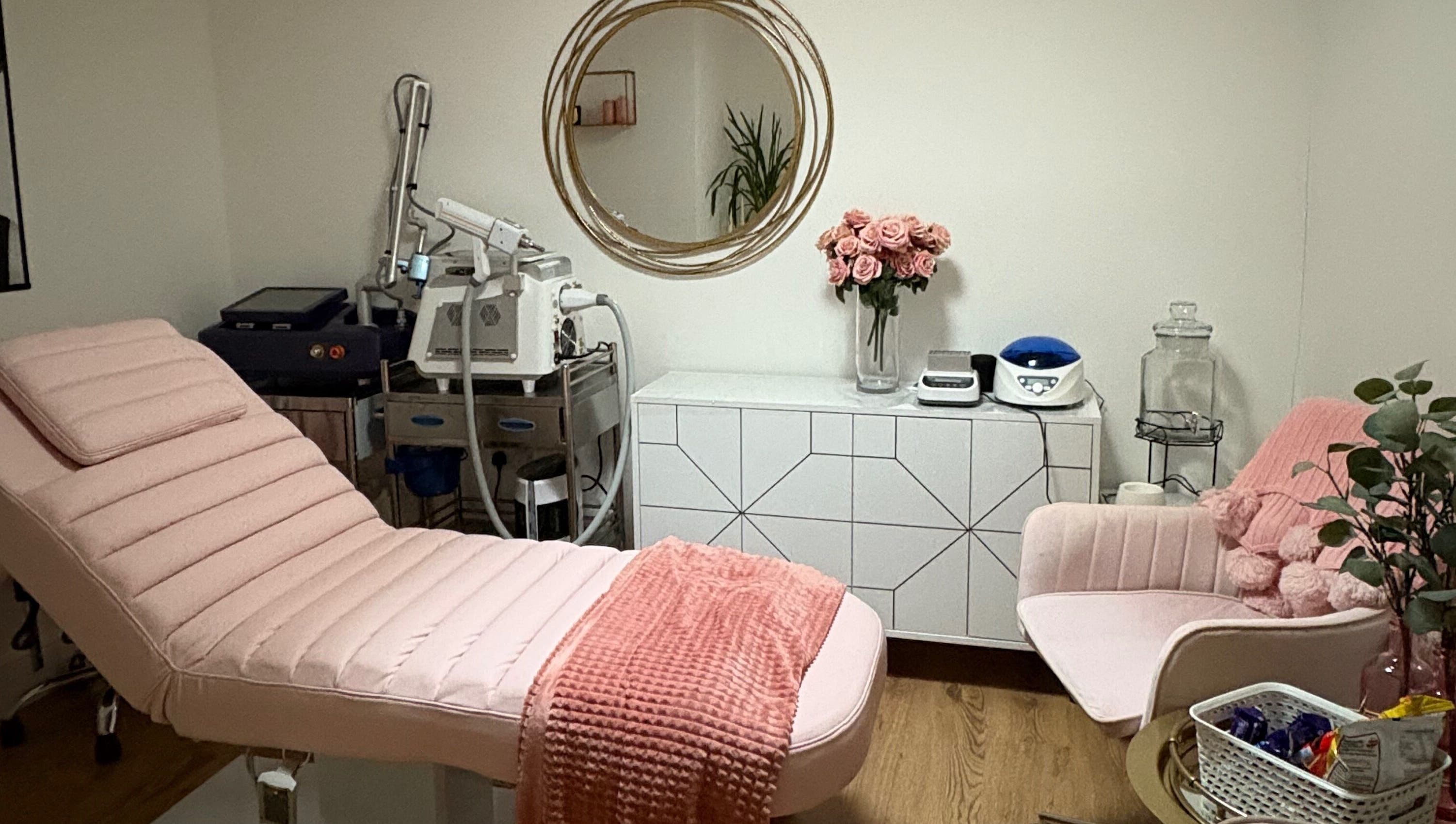 Chic treatment room at Ethereal Aesthetics, London, England, GB with elegant decor and modern equipment.