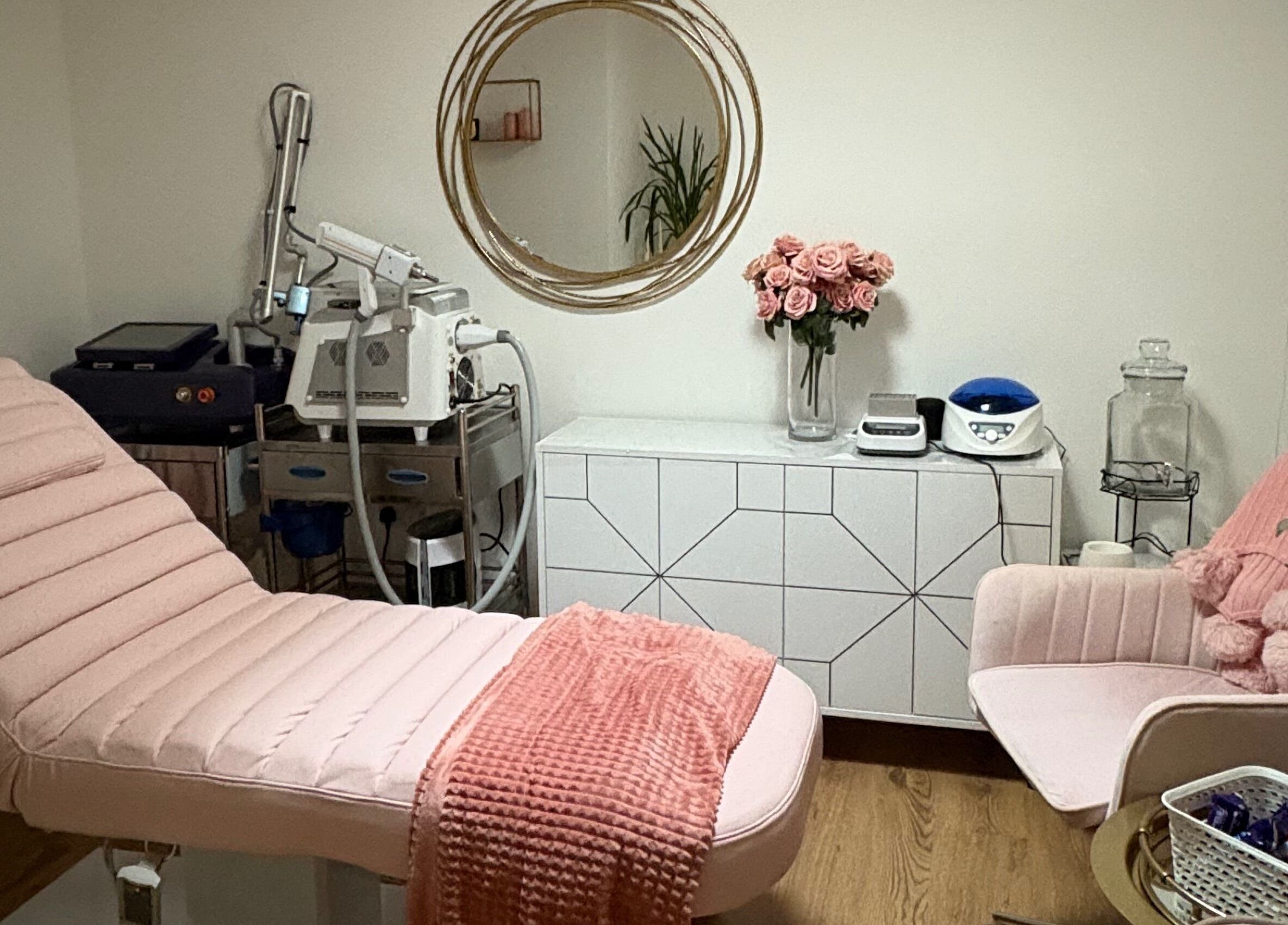 Chic treatment room at Ethereal Aesthetics, London, England, GB with elegant decor and modern equipment.