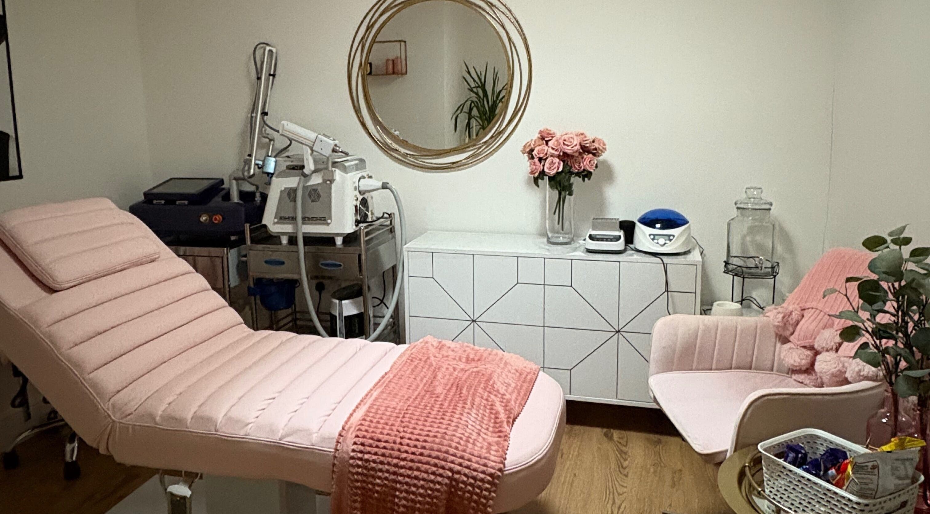 Chic treatment room at Ethereal Aesthetics, London, England, GB with elegant decor and modern equipment.