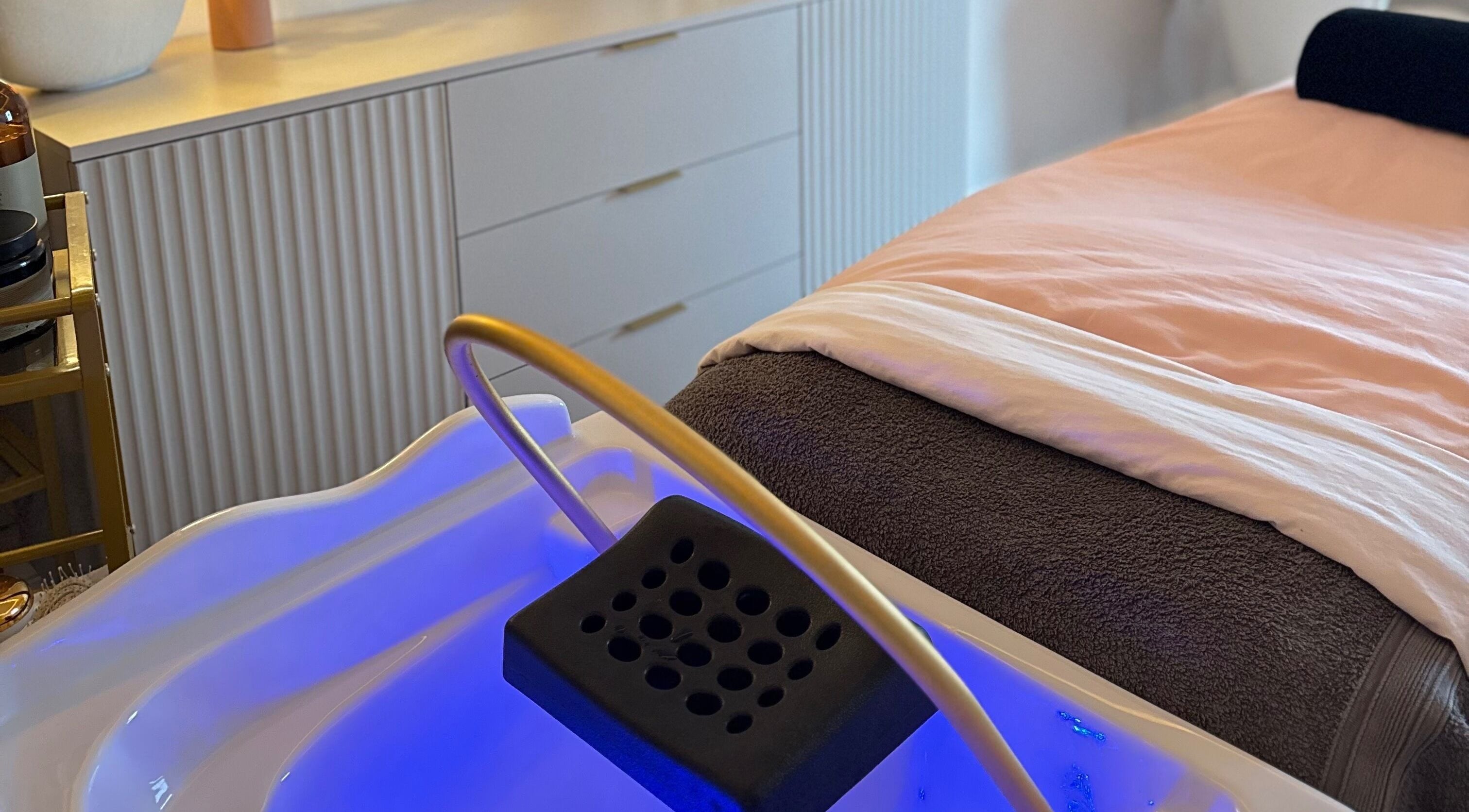 Luxurious spa treatment bed at Me Scalp & Skin Studio in Egham, England, GB.