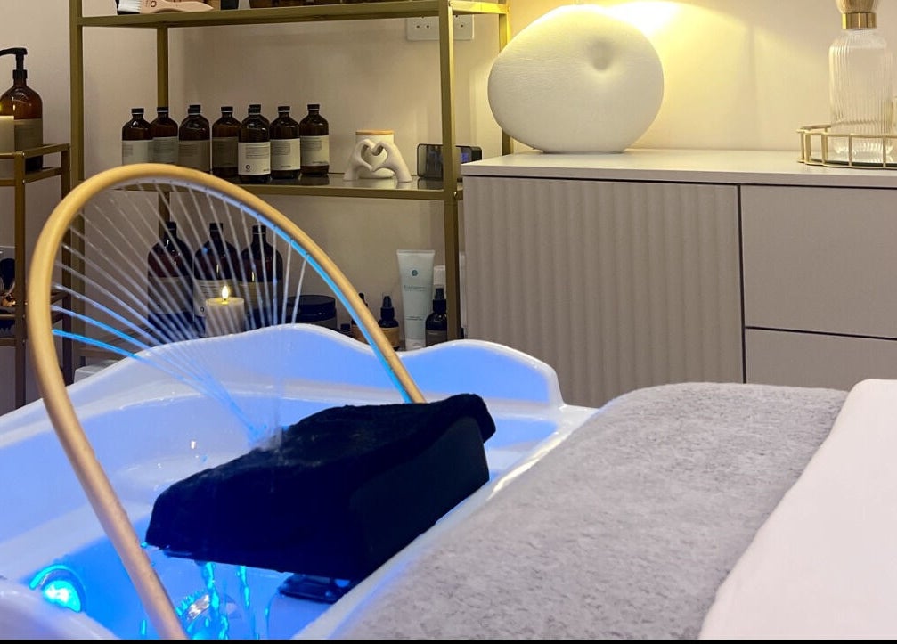 Relaxing spa setup at Me Scalp & Skin Studio in Egham, England, GB featuring luxurious amenities and products.