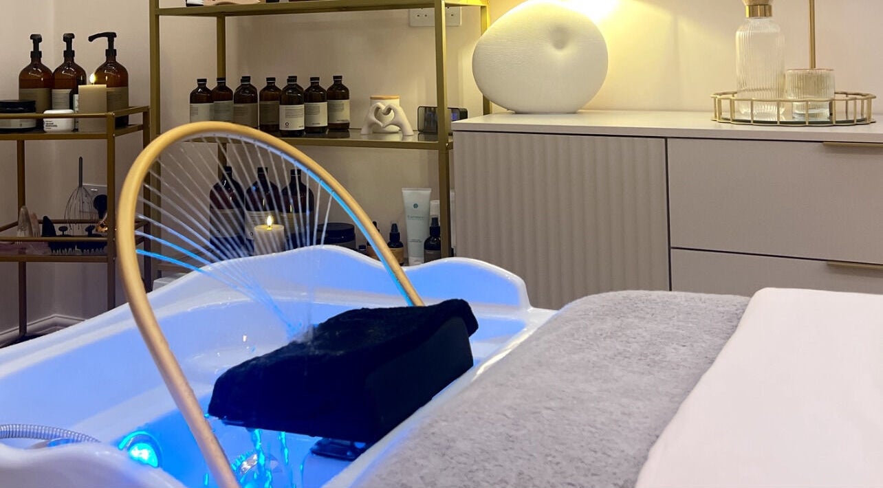Relaxing spa setup at Me Scalp & Skin Studio in Egham, England, GB featuring luxurious amenities and products.