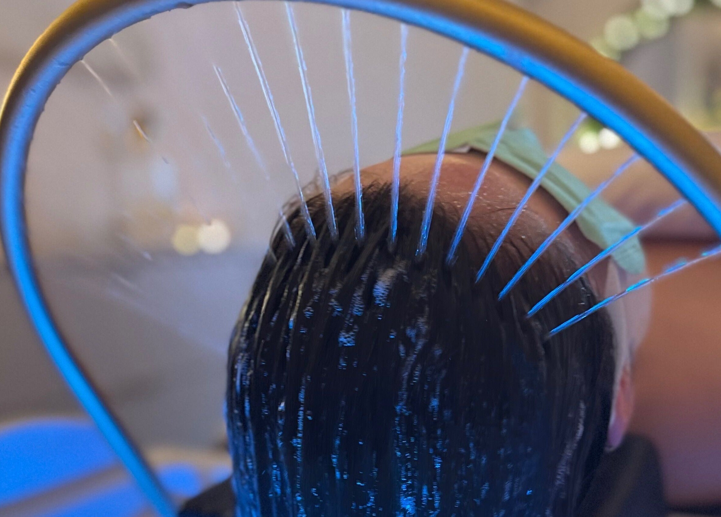 Relaxing scalp treatment at Me Scalp & Skin Studio, Egham, England, GB with cascading water jets.
