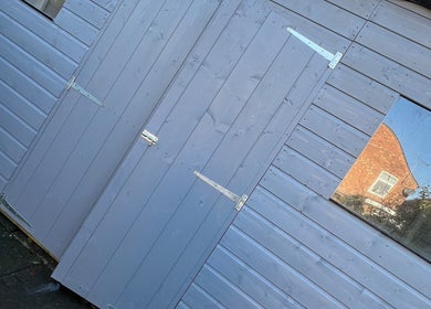 Modern blue facade at Elyssian - Skincare & Beauty, located in Southport, England, GB.