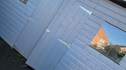 Modern blue facade at Elyssian - Skincare & Beauty, located in Southport, England, GB.