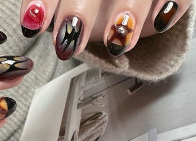 Chic nail art design at CutieNailStudio, Glendora, California, US. Creative nail art showcasing unique color blend.